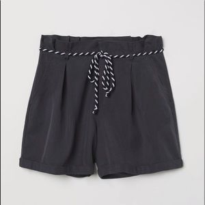 Dark grey shorts with tie belt
